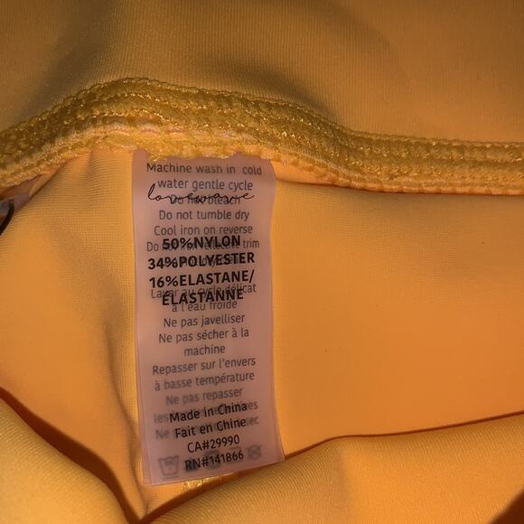 REVOLVE X LOVEWAVE Luka Leggings. Medium. Yellow. - Picture 8 of 10